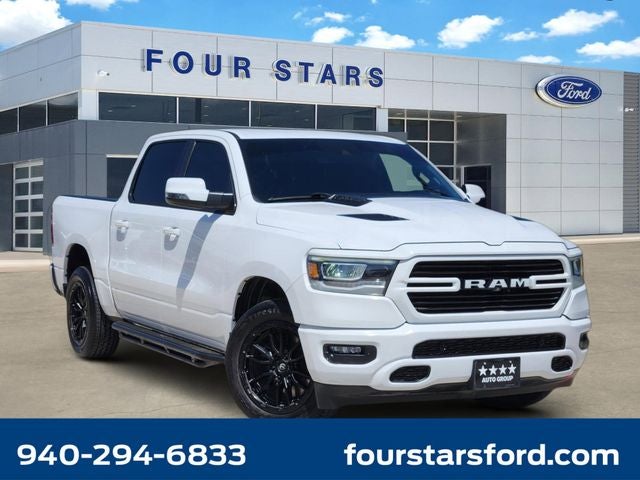 2023 RAM 1500 Laramie in Bright White Clearcoat — front three-quarter view