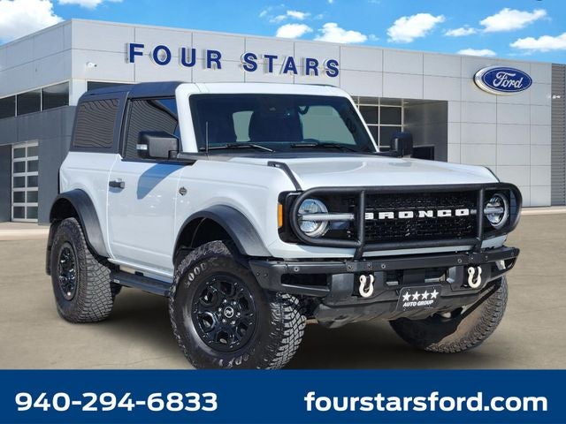 2023 Ford Bronco Wildtrak in Oxford White — front three-quarter view