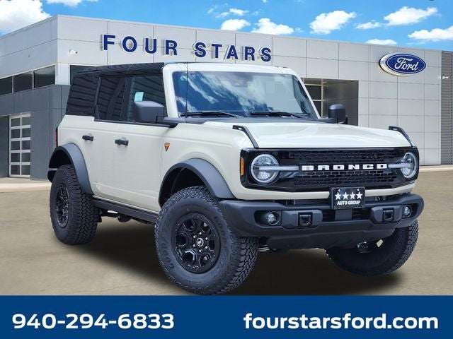 2026 Ford Bronco Badlands in Desert Sand — front three-quarter view
