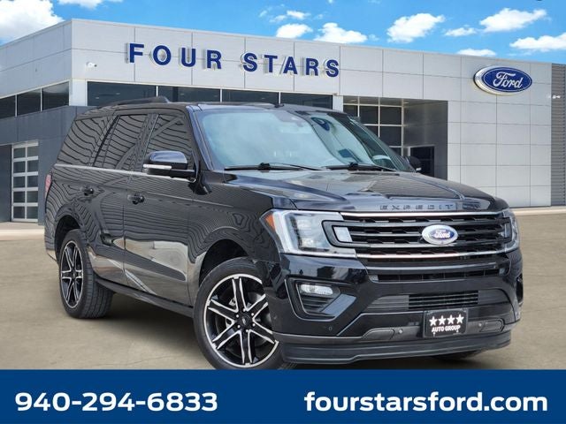 2021 Ford Expedition Limited in Black Metallic — front three-quarter view