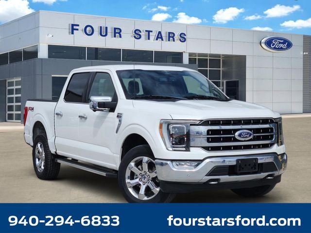 2023 Ford F-150 Lariat in White Metallic — front three-quarter view