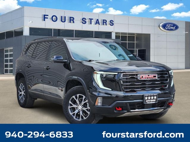 2026 GMC Acadia AT4 in Ebony Twilight Metallic — front three-quarter view