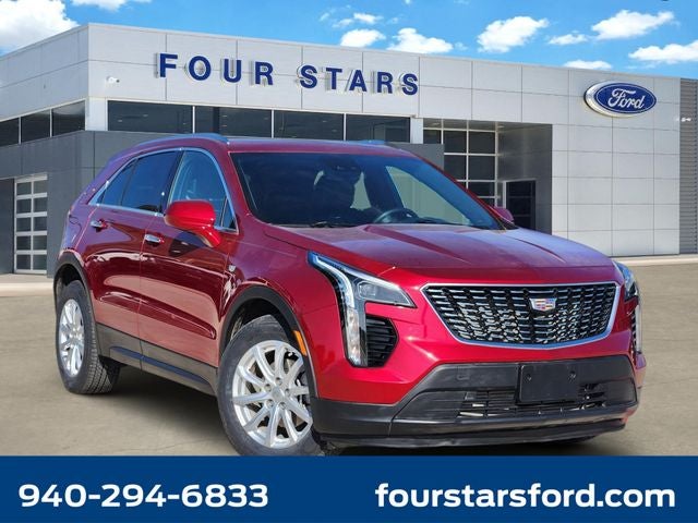 2021 Cadillac XT4 Luxury in Infrared Tintcoat — front three-quarter view