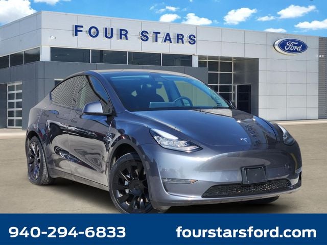 2021 Tesla Model Y Long Range in Midnight Silver Metallic — front three-quarter view